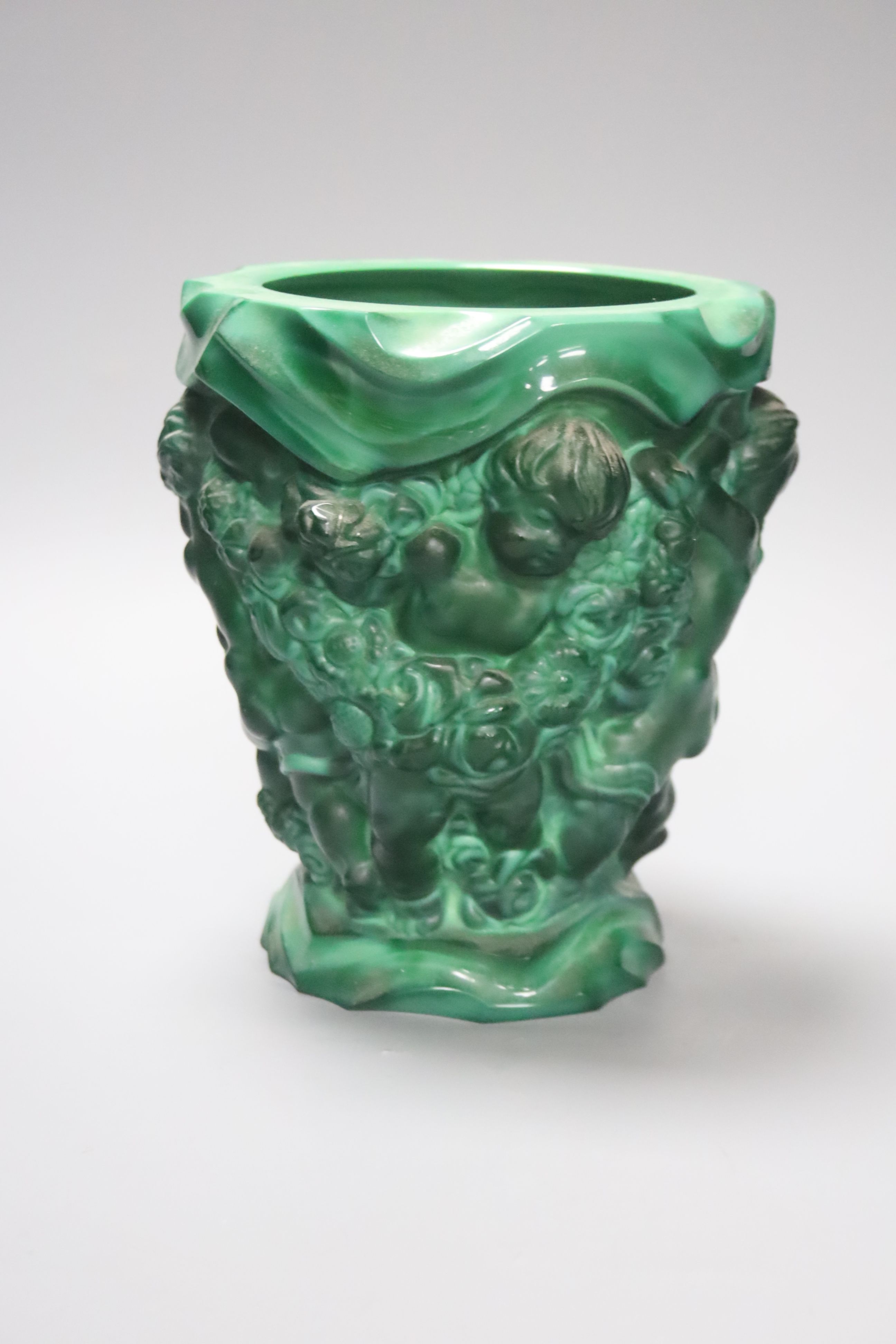 A Czech malachite glass vase with cherubs designed for Schlevogt, c.1920, height 19cm